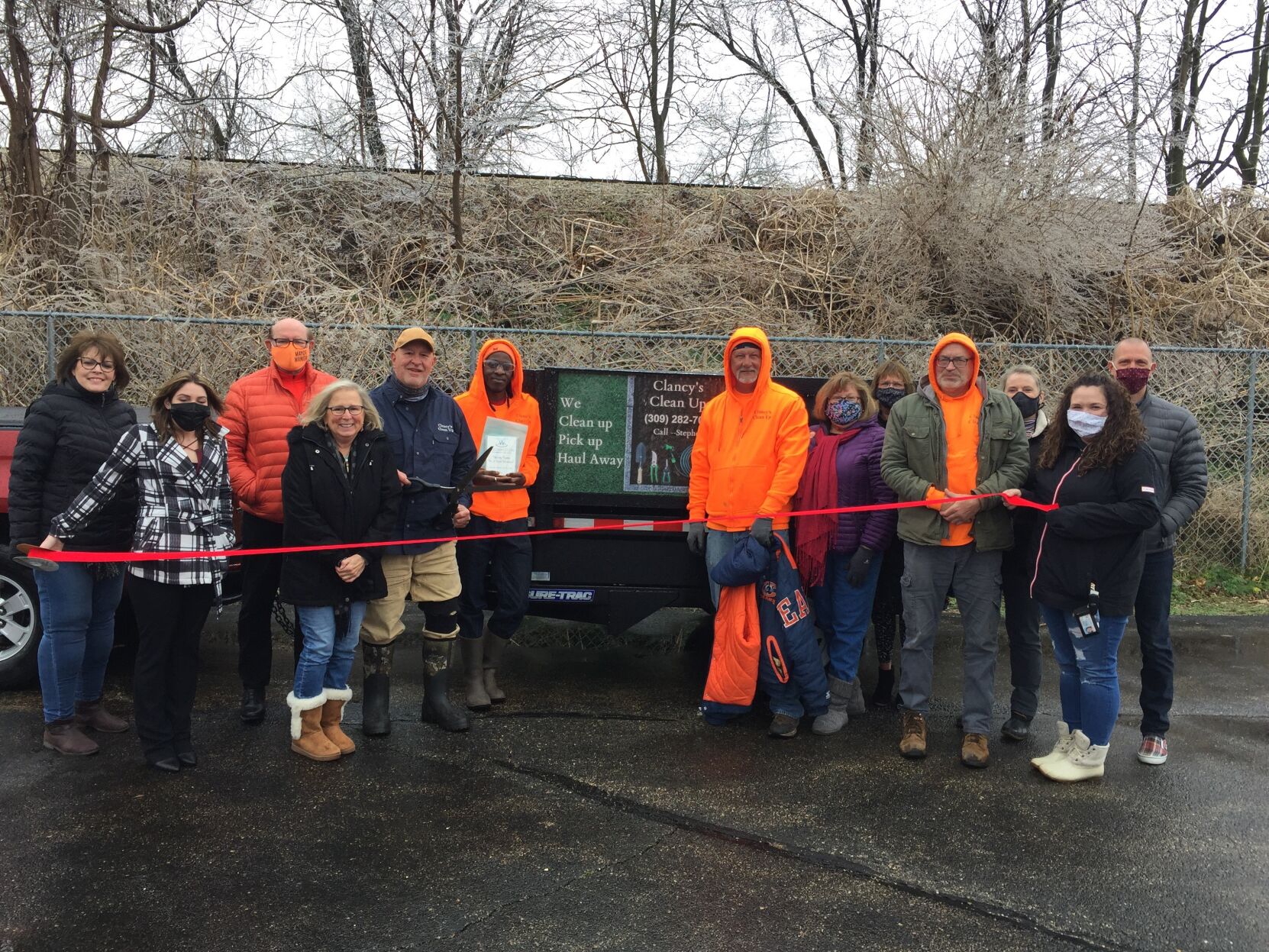 Clancy's Cleanup ribbon cutting